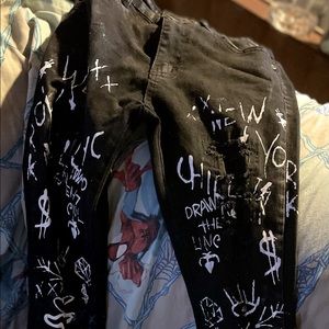 Boys size 16 black design jeans wore once.